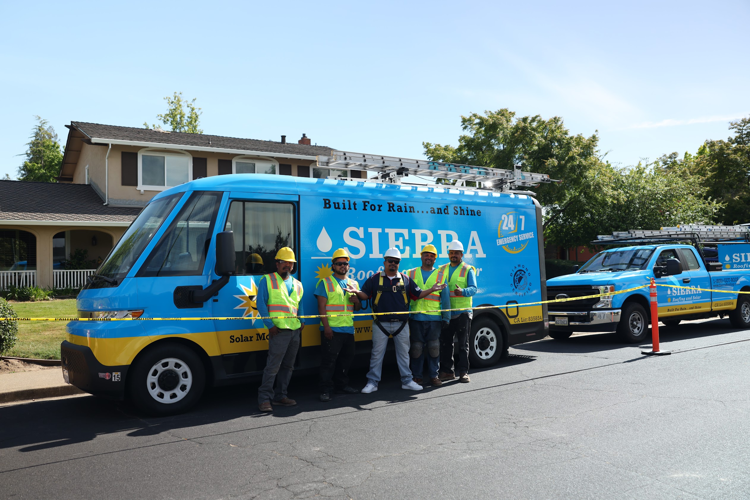 Sierra Roofing Team In Front of Van